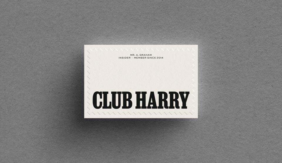 a printed card with the Club Harry badge