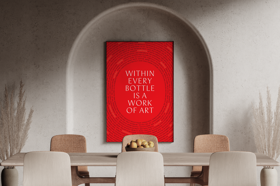 a kitchen table scene with a poster reading Within Every Bottle Is A Work Of Art